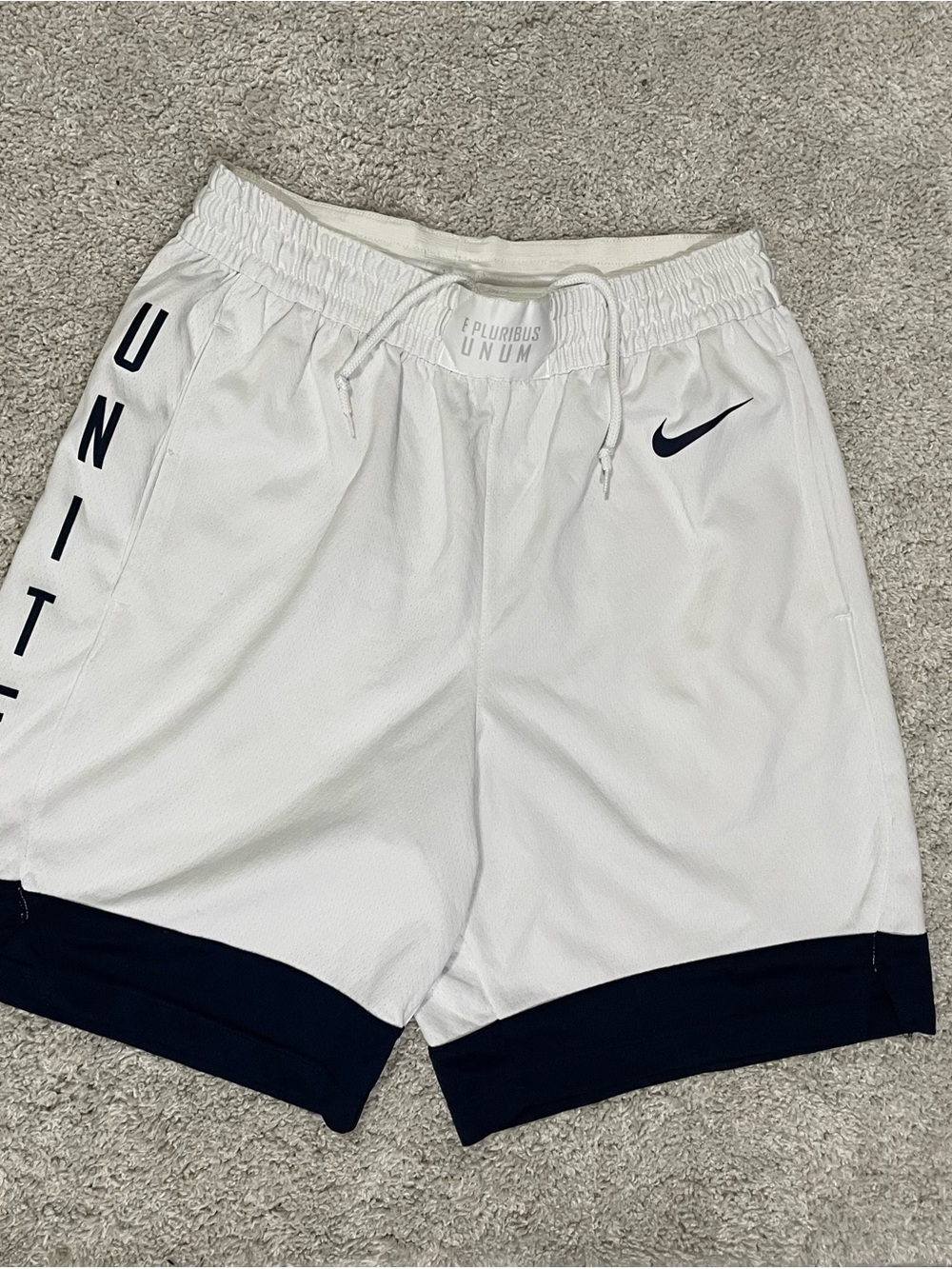 Nike Men’s White Athletic Shorts with Navy Hem and Swoosh